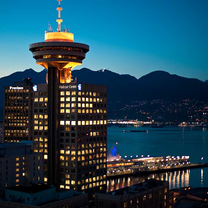 The Vancouver Lookout rises tall above Vancouver's downtown core.